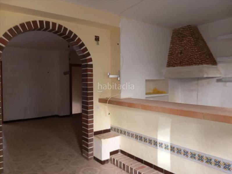 Foto f1d37f5c-56da-4ce7-90a3-937831c2520d. Casa adossada a Cúllar