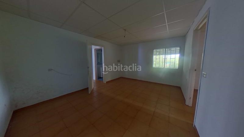 Foto 5206c9d4-8eef-4f45-bc1d-e7c9888456d4. Casa in Puebla del Río (La)