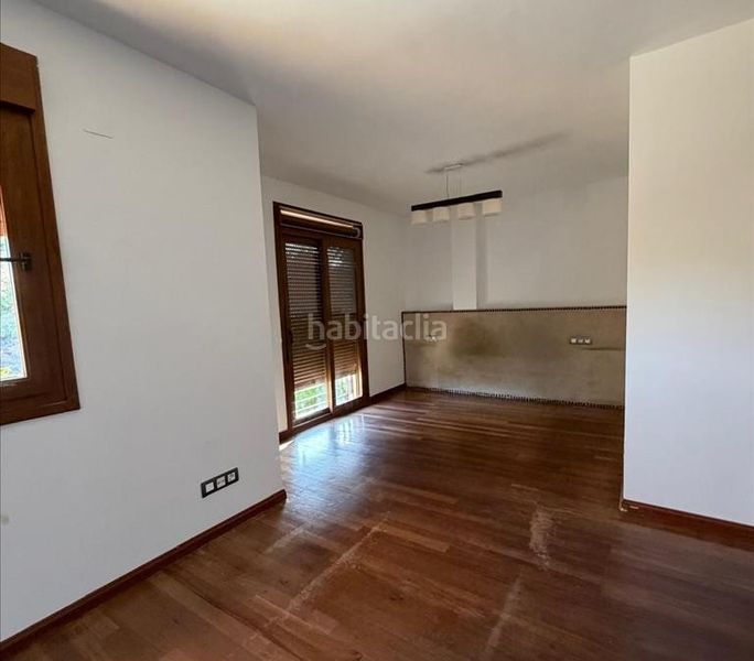 Foto 15ca950c-5573-403d-9aee-7979a5053d1b. Casa adossada amb aparcament a Parque Clavero Málaga