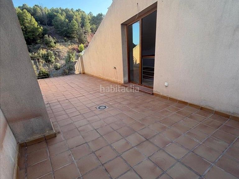 Foto cb2d96f0-60eb-4863-90cd-6e678e5168d9. Casa adossada amb aparcament a Parque Clavero Málaga