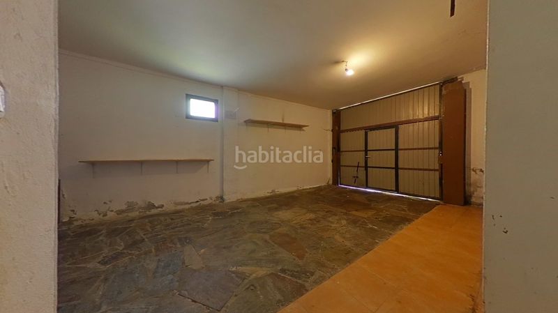 Foto 0ea08128-2dd0-4807-b65b-8dc1e0c09a72. Casa adossada a Carracedelo