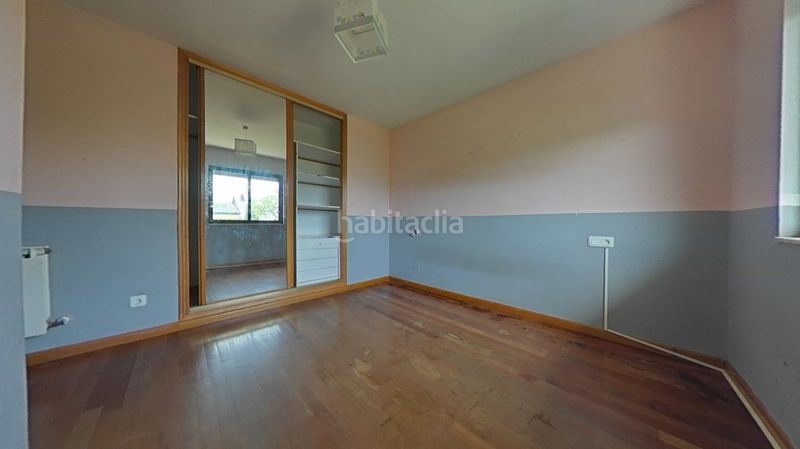Foto 59f458c8-d934-4dbb-8020-2696c9081478. Casa adossada a Carracedelo