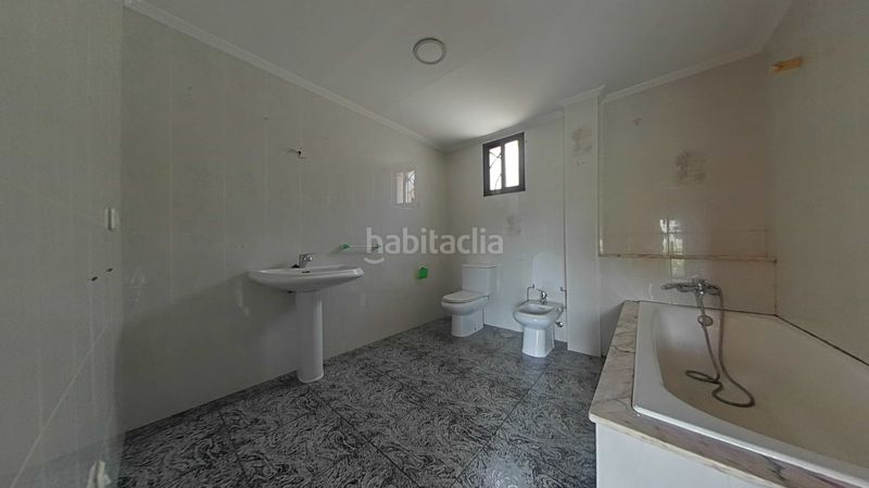 Foto 5bdbb1d6-0391-45fa-828a-885b64cbd4e1. Casa adossada a Carracedelo