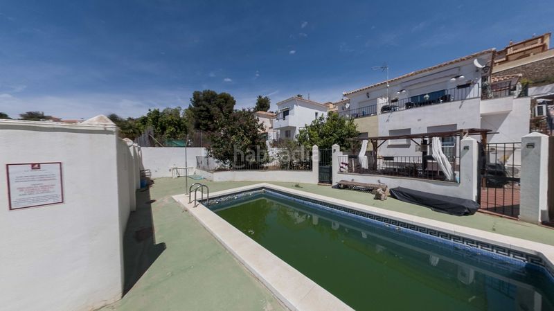 Foto 17b7a4a9-7ad0-447c-8593-981cf5709538. Casa amb aparcament a Urbanización Santa Rosa Torrox