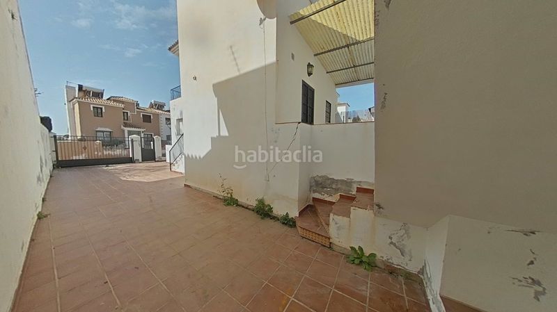 Foto 38417767-1836-45fa-a44d-6694e1b0168c. Casa amb aparcament a Urbanización Santa Rosa Torrox