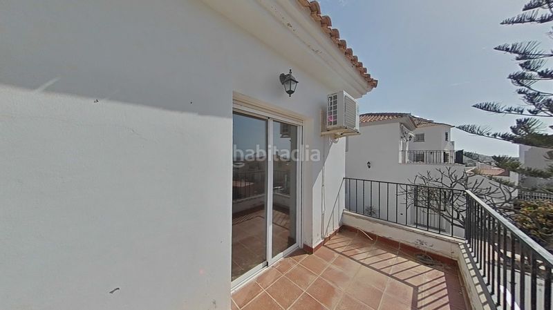 Foto 53d60b7b-f717-4114-9bd3-64c2fc3172d8. Casa amb aparcament a Urbanización Santa Rosa Torrox