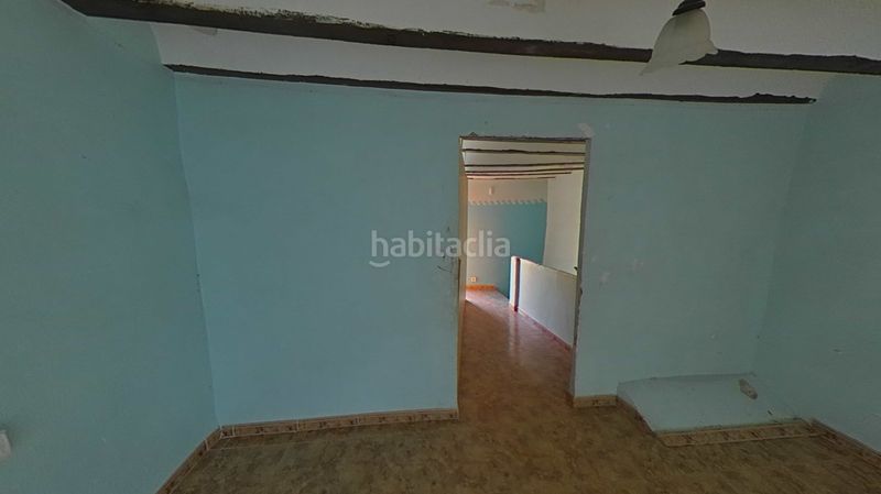 Foto ffdb72e9-f160-4367-854d-1a6bbbc1346f. Casa adossada a Mula