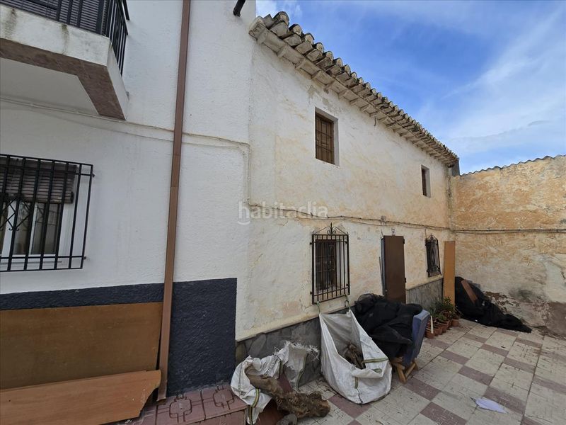 Foto c5c90bd5-7eb1-4f63-8196-0c85549e38db. Casa adossada a Píñar