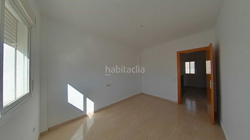 Foto 47c16a2c-b82b-4b5f-80a6-6d48f61ad5c2. Casa adossada amb aparcament a Berja