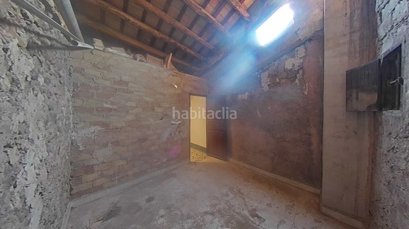 Foto c7ae9304-bcd3-4e22-9761-b44c8a69ebcc. Casa adossada a Onda