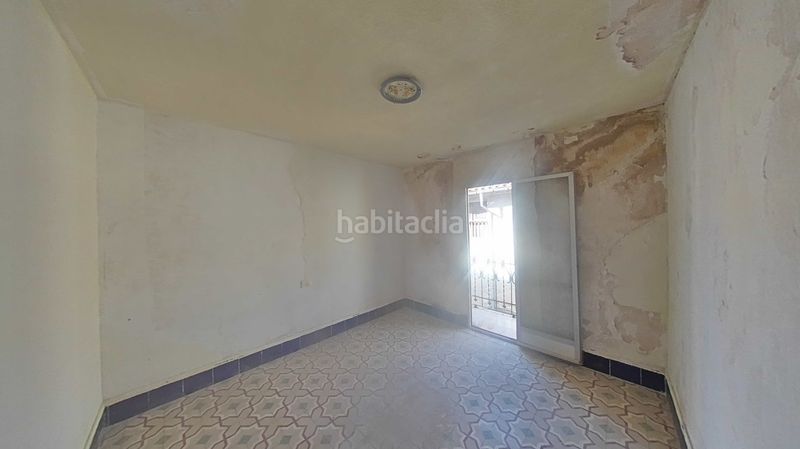 Foto f0f455a3-cb16-470a-8dfb-71044413d907. Casa adossada a Onda