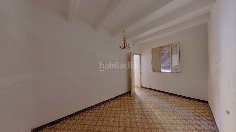 Foto 491f6aa5-22de-4bb7-93b7-4a7cb2ee739f. Casa adossada a Navàs