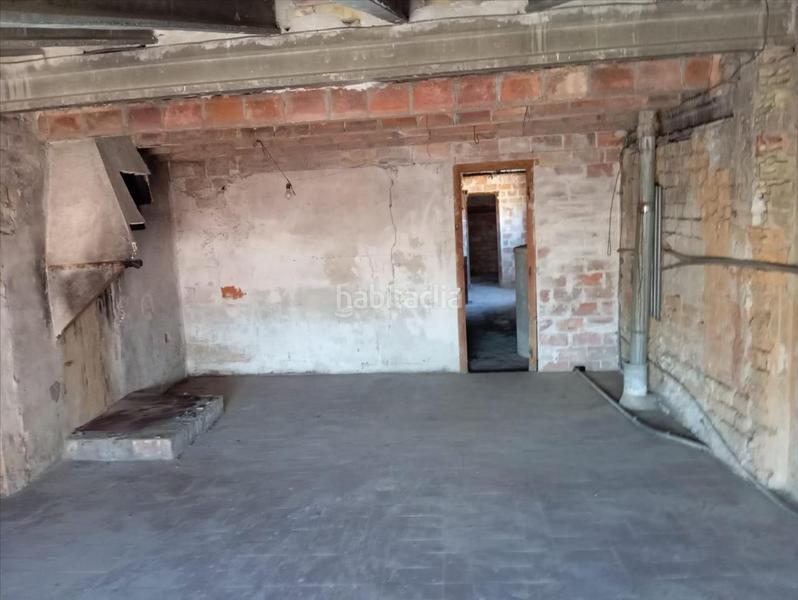 Foto 4a4e1275-cf74-486f-8bc2-33cb80c64e54. Casa adossada amb aparcament a Massalcoreig