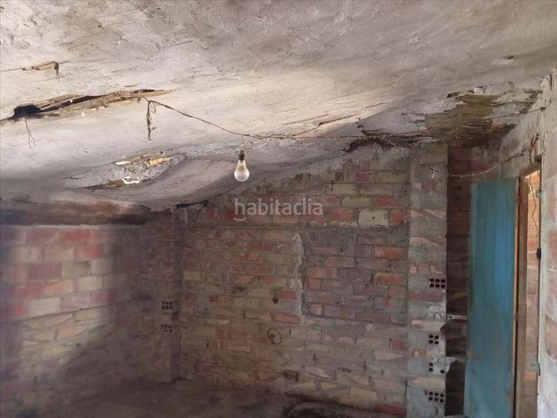 Foto f096ac65-a4de-438f-a9a6-f189f9ddce1e. Casa adossada amb aparcament a Massalcoreig