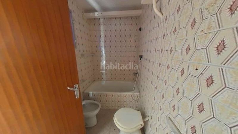 Foto ca759c0f-8cc3-4e1b-a6ff-d33b04794ec3. Casa adossada a Dos Torres