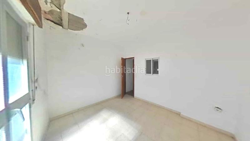 Foto f91bd4ec-be12-42de-bb63-ae331e48cfbd. Casa adossada a Dos Torres