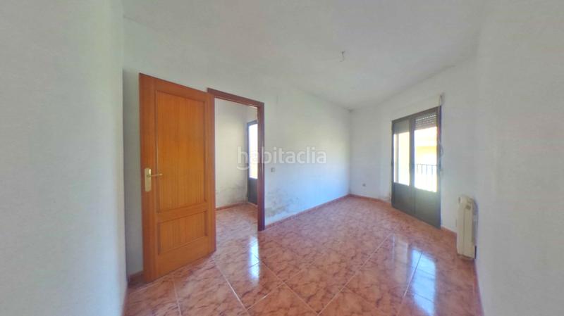 Foto e8a2c412-6e74-4d7e-b076-33ad7956f9d4. Casa adosada en Yébenes (Los)