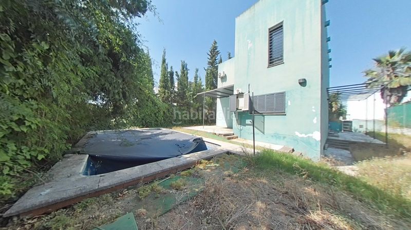 Foto 865c1db8-d93a-4b00-a796-9a6bb00d2d37. Casa amb calefacció aparcament piscina a Loreto Espartinas