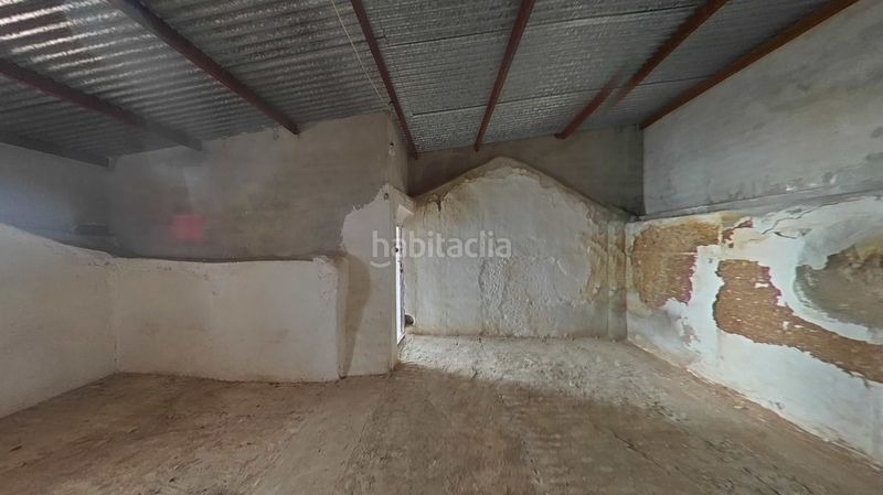 Foto 02a16903-55b5-44d6-8f1b-dd096cd10d09. Casa adossada amb aparcament a Daimiel