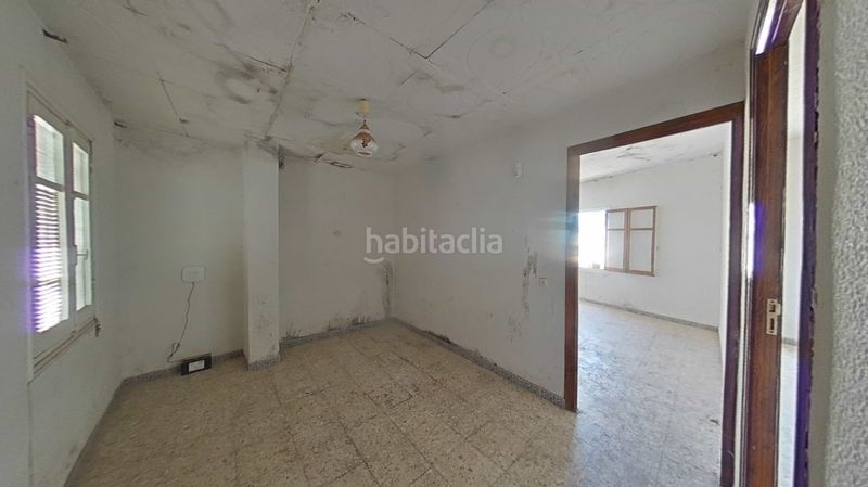 Foto 0eef7f85-9d31-421f-b1d8-3b8e58cf0a06. Casa adossada amb aparcament a Daimiel