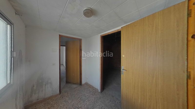 Foto 5d4cbd3d-2dd1-4269-9ded-46572e6745d9. Casa adossada amb aparcament a Daimiel