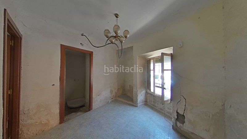 Foto 9a904636-4c05-4524-9f04-3f8a8dbfb049. Casa adossada amb aparcament a Daimiel