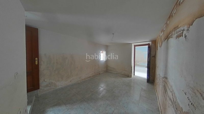 Foto 9c6c6fc8-be9d-4ae2-8aec-2799682a008b. Casa adossada amb aparcament a Daimiel