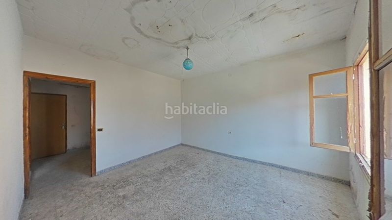 Foto a1550f23-938d-411a-8c2c-6779cdfc3234. Casa adossada amb aparcament a Daimiel
