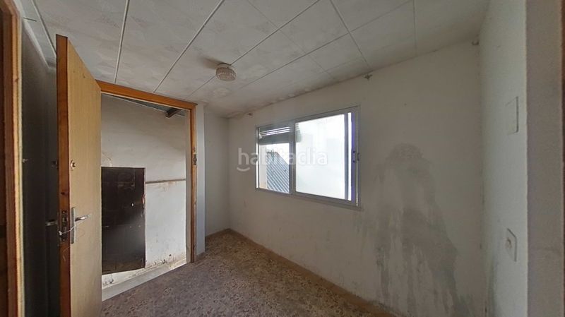 Foto a28f40ad-1ee6-428e-a406-a6f5af4024e2. Casa adossada amb aparcament a Daimiel