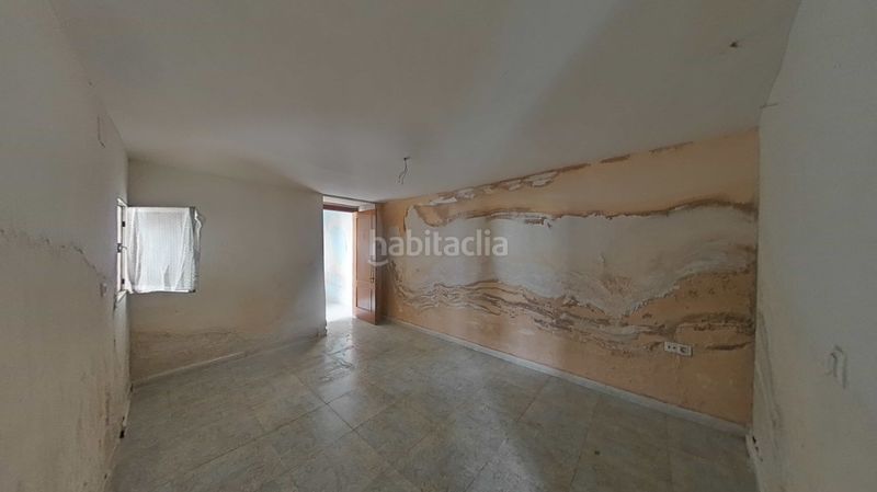 Foto a802b9fa-cf8b-4e42-b46d-bbb00f6c5737. Casa adossada amb aparcament a Daimiel
