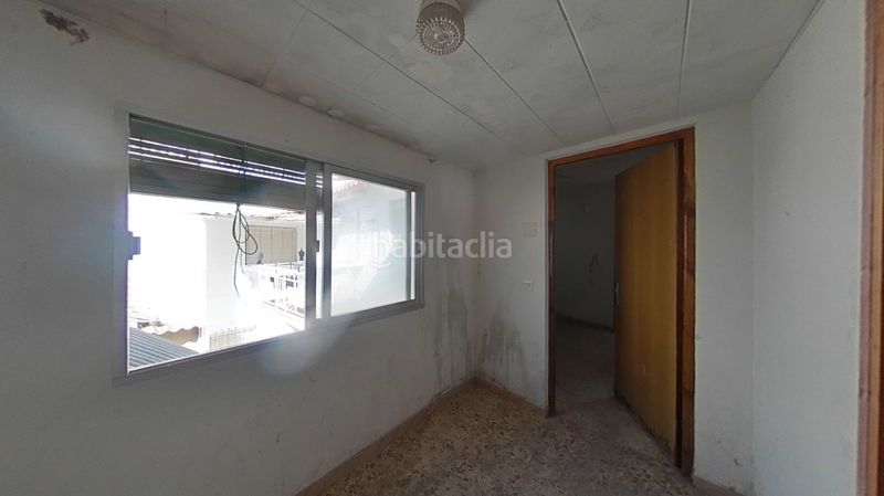 Foto f78d2ce0-2abd-4a32-b37b-70daf39507e8. Casa adossada amb aparcament a Daimiel