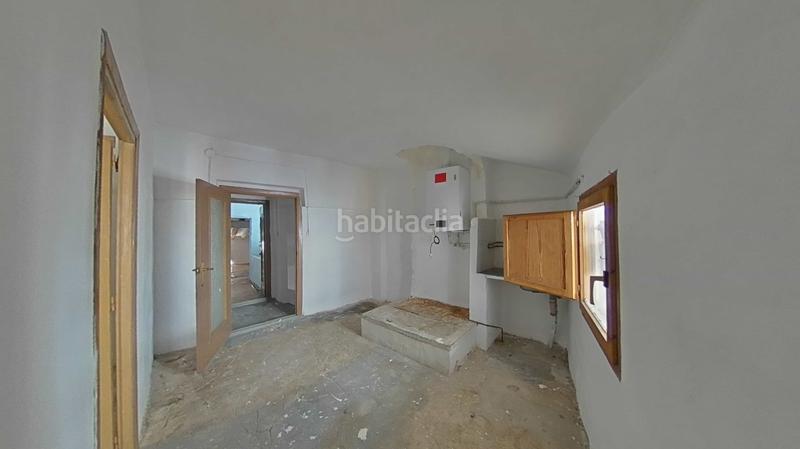 Foto c10cd249-b3f3-4495-a899-b832959cc3bb. Casa adossada a Autol