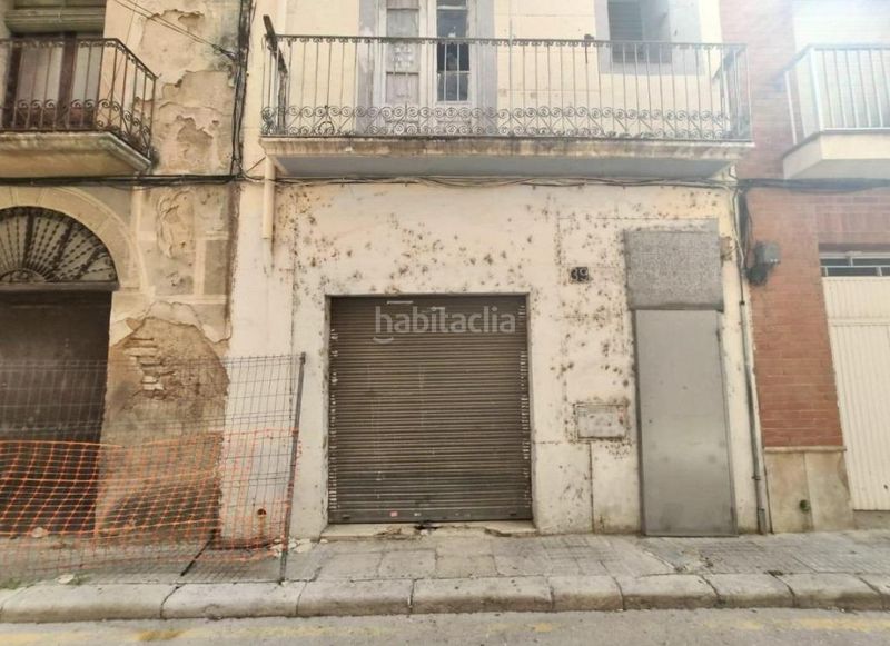 Foto 924487bc-61f9-45a8-9fa1-b3c8d2d9d027. Casa a Casc Antic Amposta