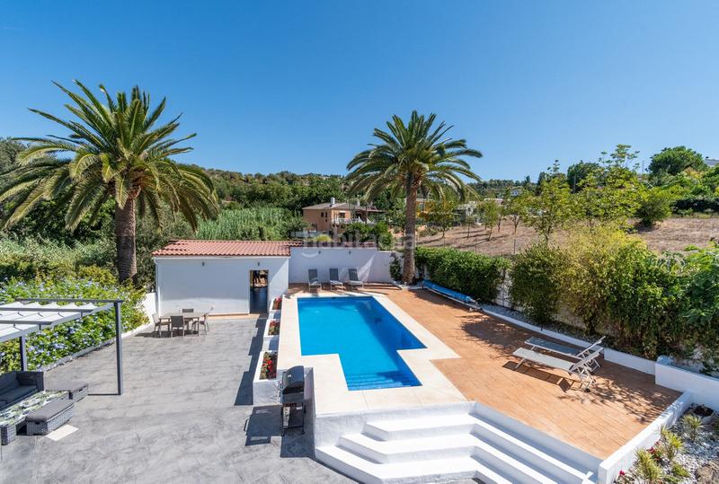 Foto 11e8069e-a6d3-42e8-8afd-c22f59da8a3d. Chalet con parcheggio piscina in Coín