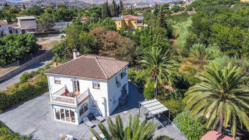 Foto a79cfb15-1de4-4d8e-9447-c4e41a700a0a. Chalet con parcheggio piscina in Coín