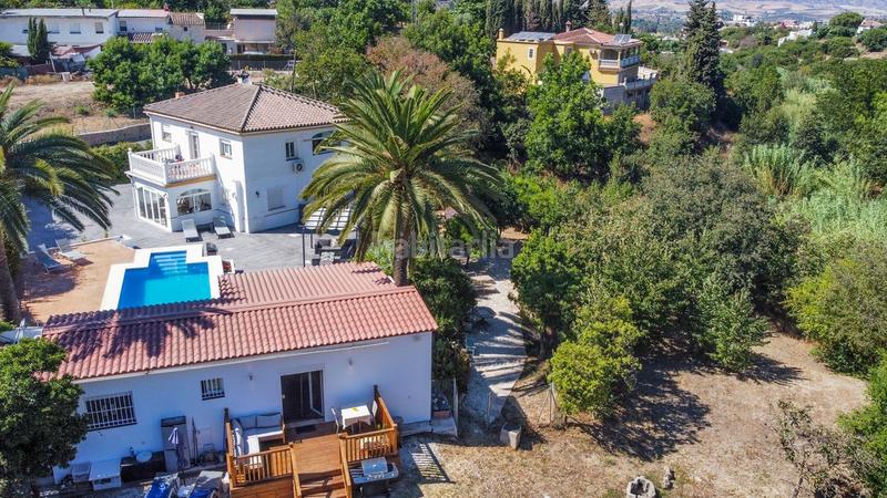 Foto d6ec9311-7f66-4ca8-8439-f6ed5abedf63. Chalet con parcheggio piscina in Coín