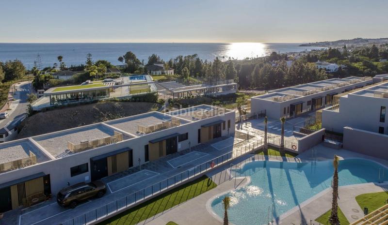 Foto 99086127-8ecd-4bbb-bc13-89457f1a1a54. Semi detached house with parking pool in El Faro de Calaburra - Chaparral Mijas