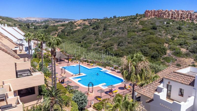 Foto ee2c8b3f-c2ae-43b7-9a94-6c895ba6917e. Apartament amb aparcament piscina a La Duquesa Manilva