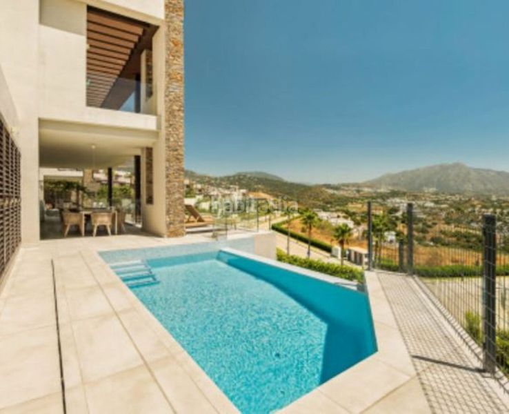 Foto 0dbbedd7-ffbd-48c6-9324-68a4172a3209. Casa adossada amb aparcament piscina a El Paraíso Benahavís