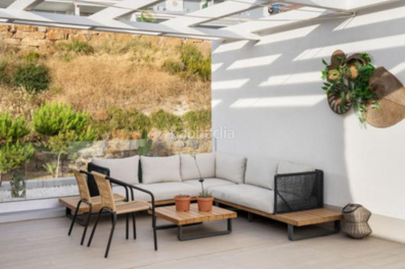 Foto db0911b9-b31e-4f42-b87f-c820ea9a23f9. Maison jumelée avec parking piscine dans Cancelada Estepona