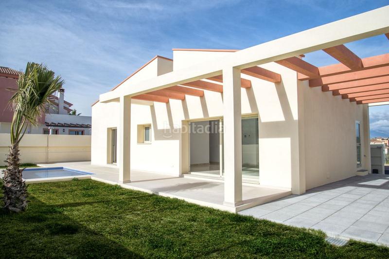 Foto 541677f1-abca-4e65-b10a-3fbbbc018c51. Casa a schiera con parcheggio piscina in Coín