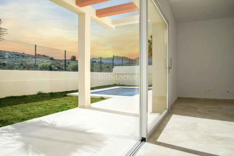 Foto ff23e15f-28e1-4650-9ad7-a39639a41fab. Casa a schiera con parcheggio piscina in Coín