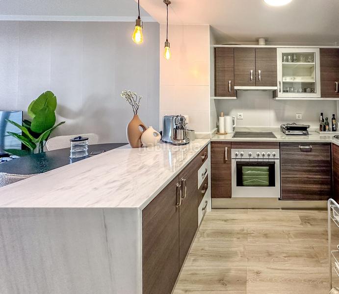 Foto 544e20bf-8864-49ec-8834-b26396390e90. Rez-de-chaussée avec piscine dans Chullera Manilva