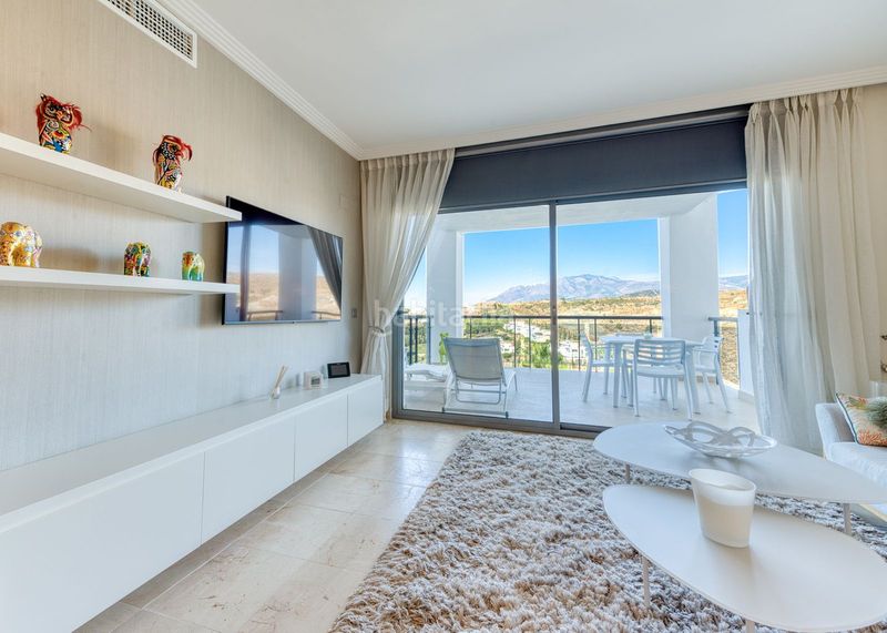 Foto 5facc1f3-cb6f-4fc8-a913-a7d465694c15. Apartament amb aparcament piscina a Los Flamingos Benahavís
