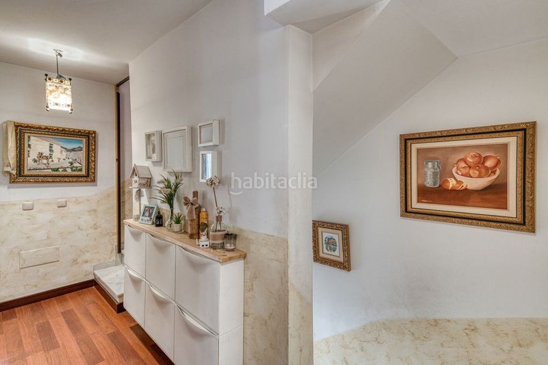 Foto ac908393-8435-4322-baa3-e7fda05fbc7f. Casa adossada amb aparcament a Coín