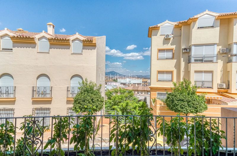 Foto e5f304b8-a43c-4e9f-91ba-74204e3d376e. Casa adossada amb aparcament a Coín