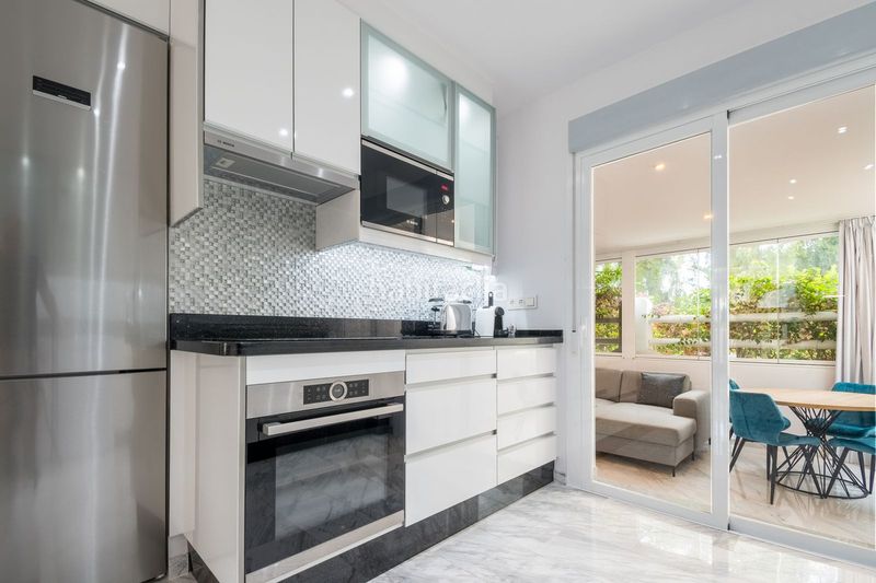 Foto 9915b2d0-5cf3-4d64-b40c-6368c1f19652. Planta baixa amb aparcament piscina a La Carolina - Guadalpín Marbella