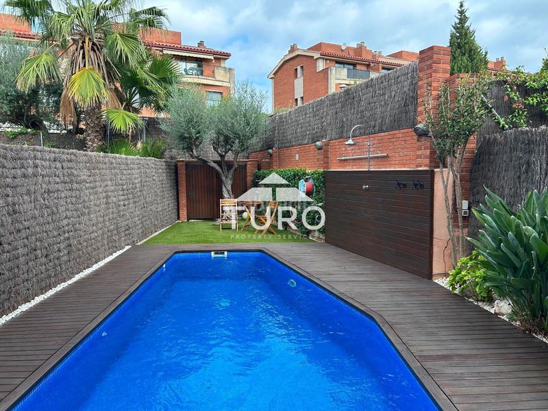 Foto 60c8d1bd-5c09-4d1f-8c6a-711d6a663233. Casa adossada amb calefacció aparcament piscina a Sant Cugat del Vallès