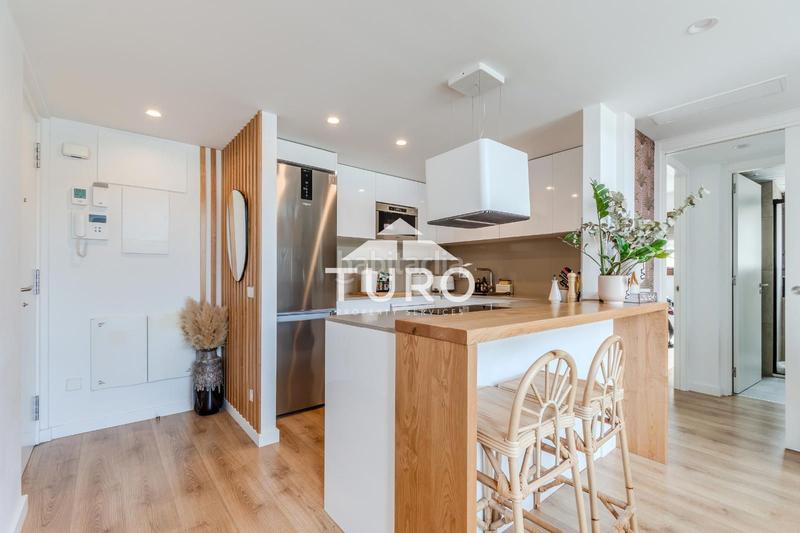 Foto 2e5e1ef3-3b4c-4cc1-90e8-22ee4a755695. Piso  moderno con jardín y piscina en Montilivi, en Girona