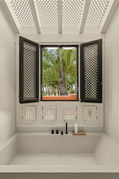 Foto 95287815-9937-4055-b8bd-bae032909b25. Casa adossada amb aparcament piscina a Puente Romano Marbella